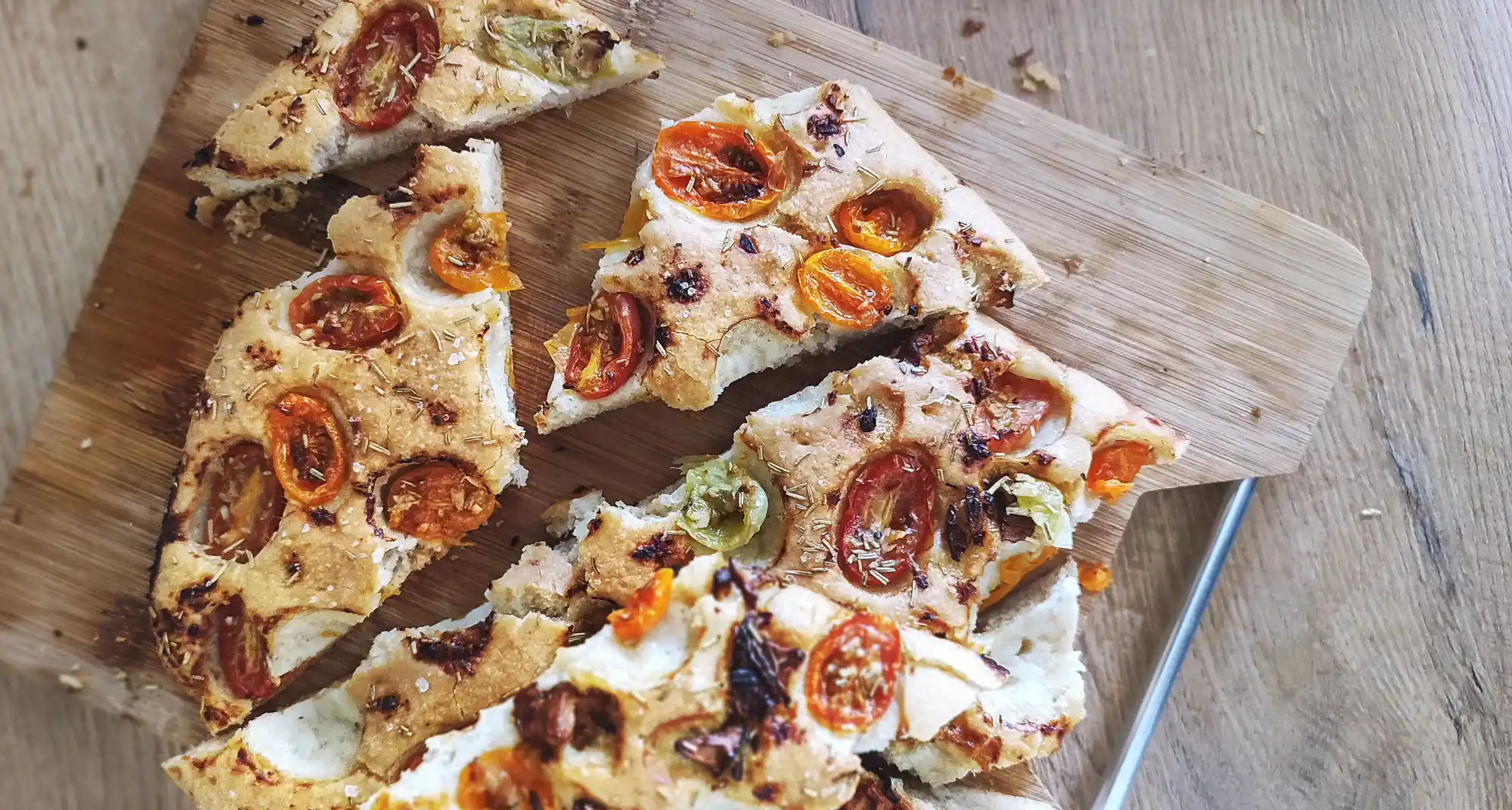 Homemade Focaccia Bread with Tomatoes and Rosmarin