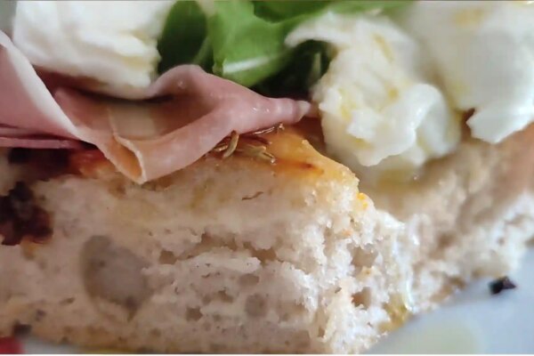 Homemade Focaccia Bread with Tomatoes and Rosmarin