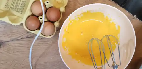 Whisk the egg yolks until light and fluffy.