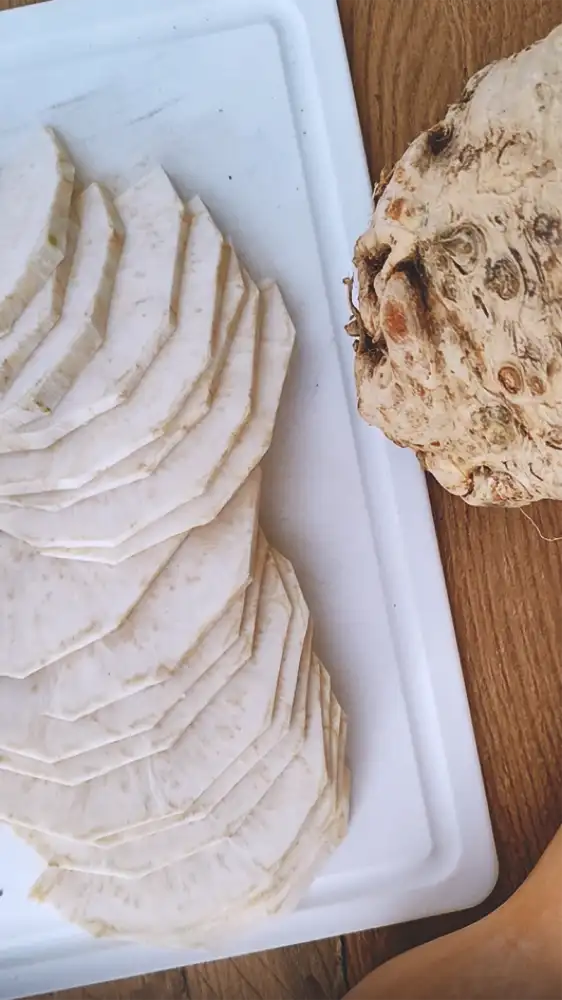 Celery root slices prepared for breading